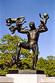 Oslo, Norway. Vigeland Park. Sculptures of the bridge, Man chasing four geniuses.